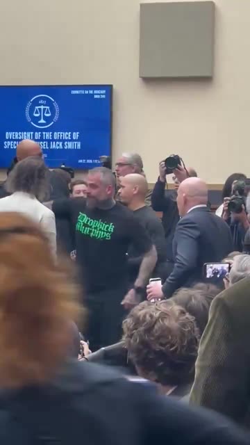 Ink-drenched celebrity J6 Democrat cop Michael Fanone nearly comes to blows