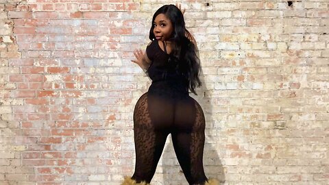 Thick ebony shaking ass with transparent one piece