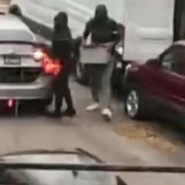 Suspects Seen Stealing Property from Van in Broad Daylight