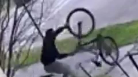 Man in Hoodie Seen Taking Bicycle from Residential Property