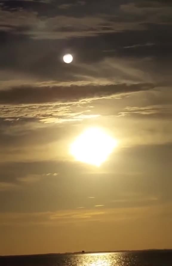 2 suns and a moon in the same sky?