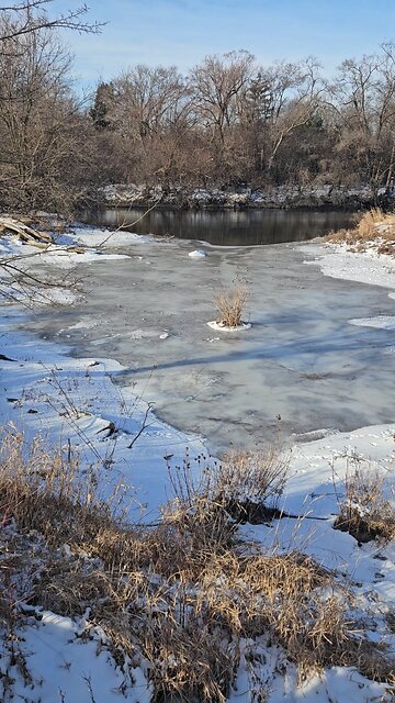 A Little Snow Pyramid Behind Green Lake