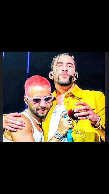 🤡 degenerate Bad Bunny falls on stage Biden style