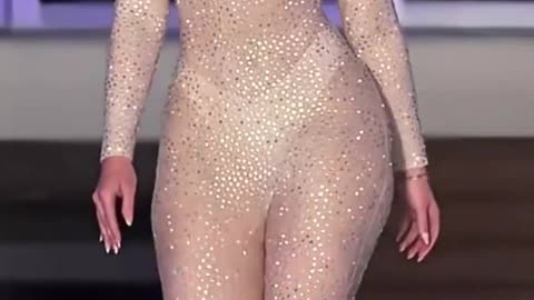 This glitter jumpsuit shines like a diamond on the runway ✨