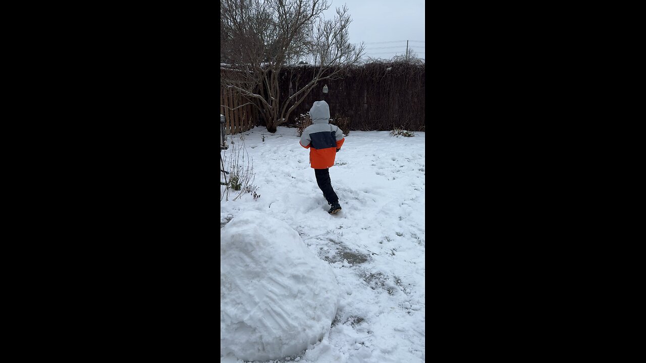 KIDS PLAYING IN SNOW