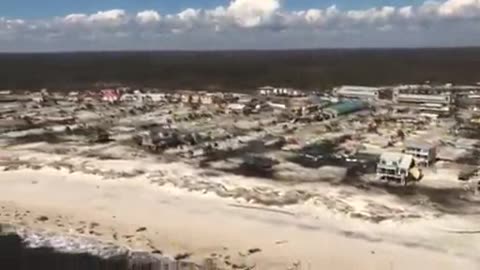 A USCG Aircrew Assesses the Damage of Mexico Beach, Florida, from Hurricane Michael
