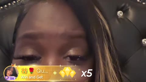 Ebb got her $80 sew-in and chunky press on nails on and is cam up