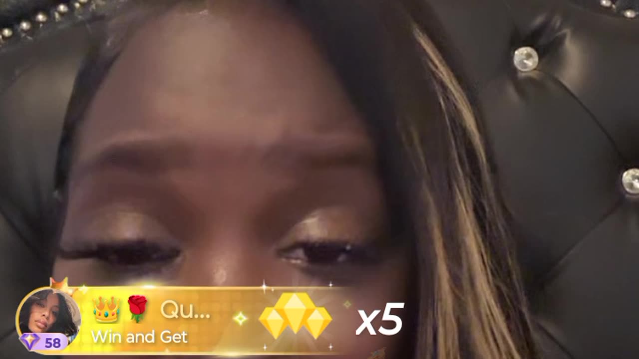 Ebb got her $80 sew-in and chunky press on nails on and is cam up
