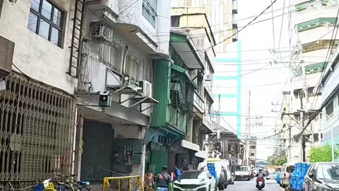 Morning Grind on Lara Street in Manila City, Philippines
