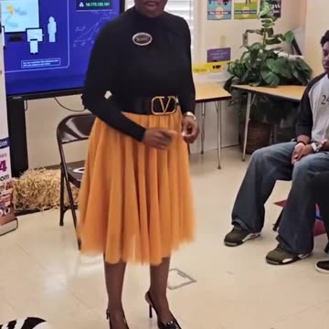 How a lady picks something up from the floor.