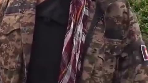 In Luton an Afghan asylum seeker comes out of his accommodation