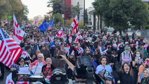 People are chanting “the revolution” as they’re marching #GeorgiaProtests
