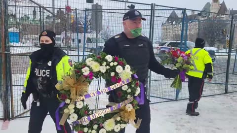 Honoring the fallen solders with wrist and flowers by CIC of Kingdom of Canada,Queen Romana