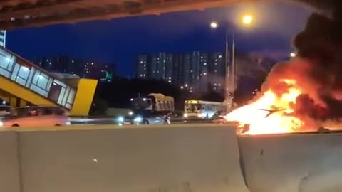 Tesla Model 3 crashes into parked truck. Shortly after...