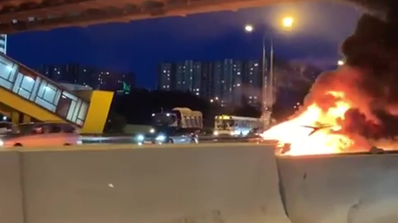 Tesla Model 3 crashes into parked truck. Shortly after...