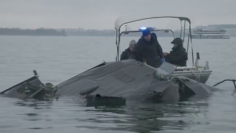 Investigators Search D.C. Plane Crash Wreckage