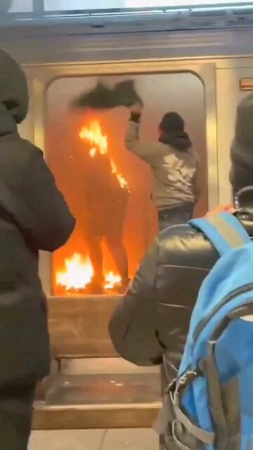 Lady lit on Fire on the F train