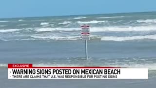 Warning signs installed on Mexican beach declaring area restricted by U.S.