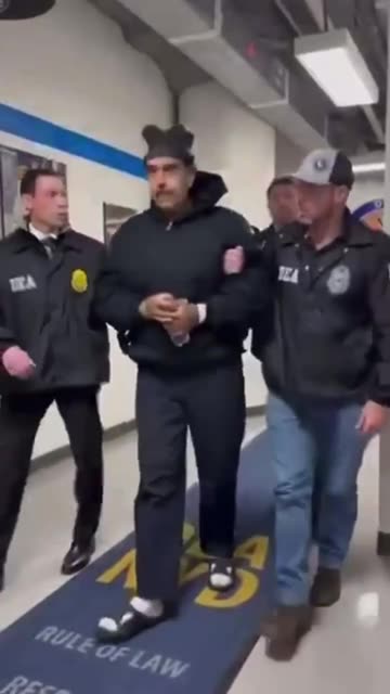 Kidnapped President Maduro enters DEA headquarters in Manhattan, escorted by Kidnappers
