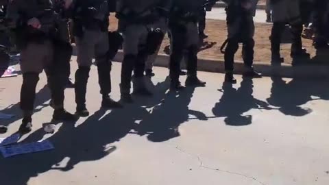 Peacefully protesting where 5-year old Liam Ramos has been detained,