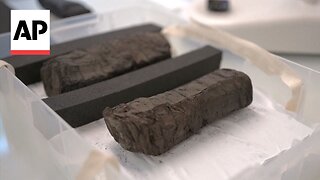 Scientists try to decipher ancient scrolls charred by Vesuvius volcano