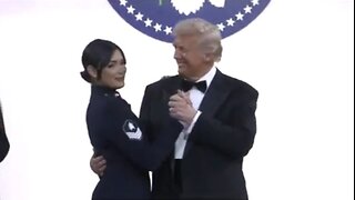 Trump dancing with a service member