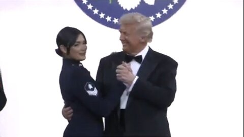 Trump dancing with a service member