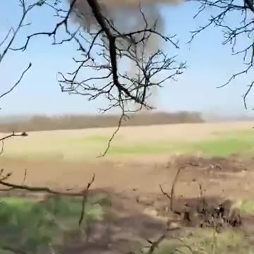 Russian Soldier Runs from The Shrapnel of an Exploding Grad Launcher a Km Away