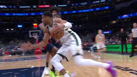 Milwaukee Bucks - Giannis going to work down low with the spin and slam.