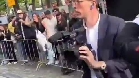 Courageous woman shouting against Ursula Von Der leyen