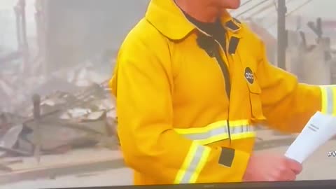 ABC News reporter David Muir wears a wooden PEG on the back of his jacket