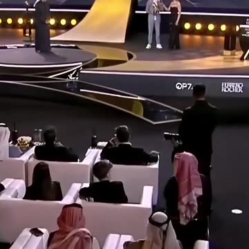 watch Cristiano Ronaldo receive his award with a smile