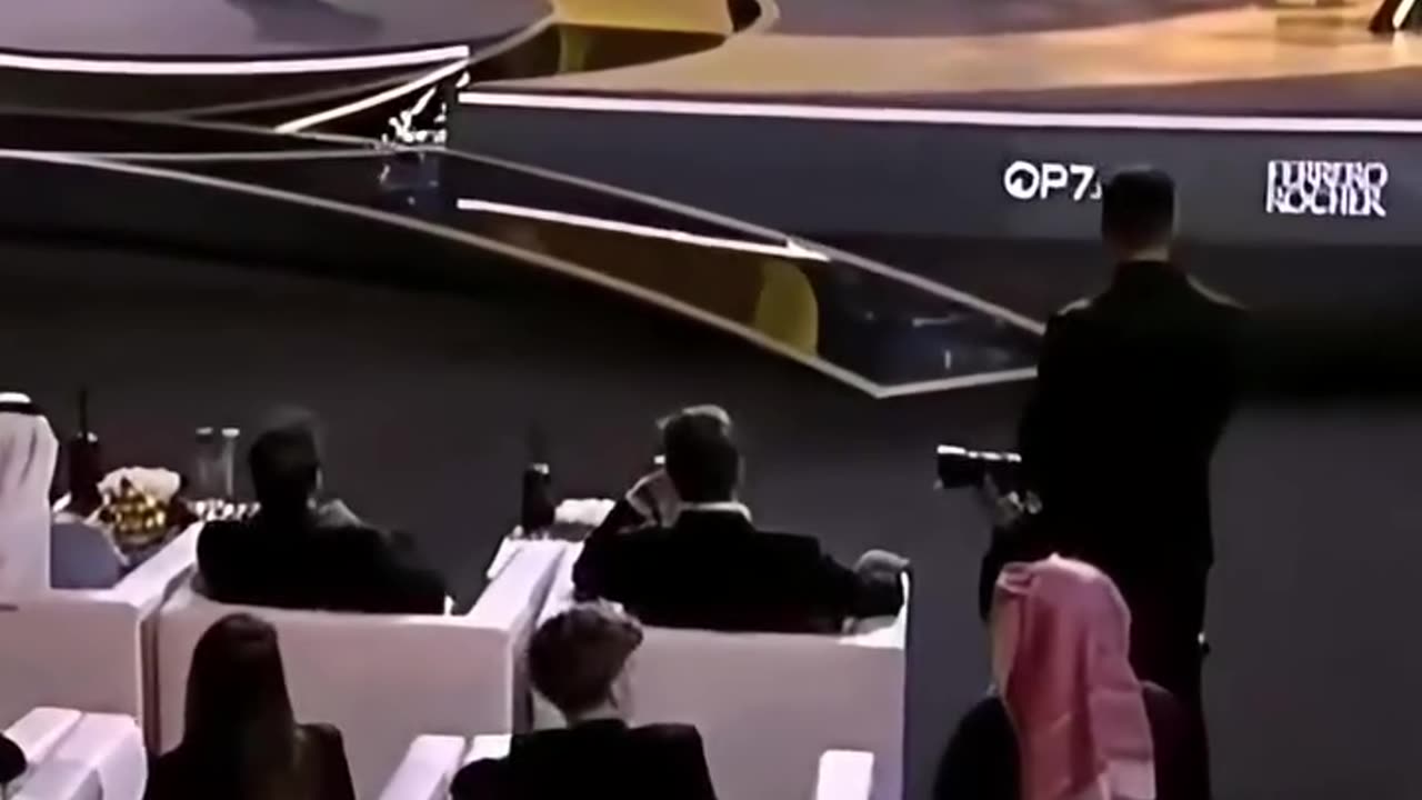watch Cristiano Ronaldo receive his award with a smile