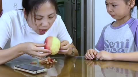 After helping her daughter peel the apple, she got angry and refused to eat it