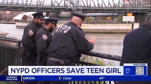 NYPD officers saw a woman in the East River and jumped into the frigid water to pull her to safety