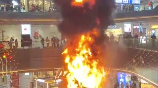 A Christmas tree inside a Chinese mall caught fire, with reports pointing to faulty wiring