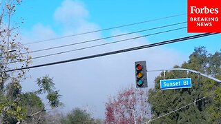 Smoke From Wildfires Across Los Angeles Seen In The Sky Above Sunset Boulevard