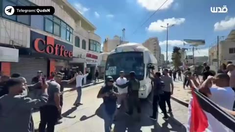 Celebration in Ramallah as several buses carrying some of the Palestinian detainees arrive