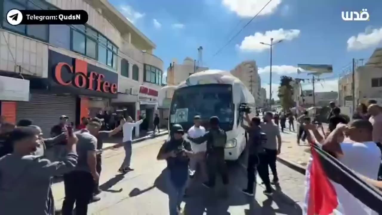 Celebration in Ramallah as several buses carrying some of the Palestinian detainees arrive