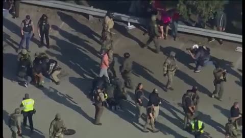 Drone video of ICE and protesters clashing in Chicago