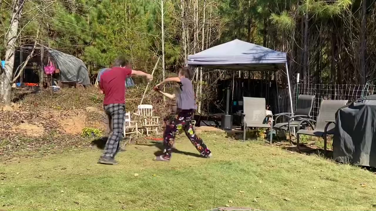 When I was a kid; Mom would get after us boys fighting with sticks!
