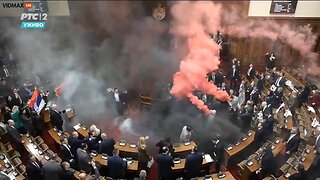 Serbian Parliament In Chaos: Opposition Party Throws Smoke Bombs…PM Has Stroke…In Critical Condition