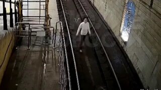 Woman Jumps In Front Of A Moving Train… Wait For It