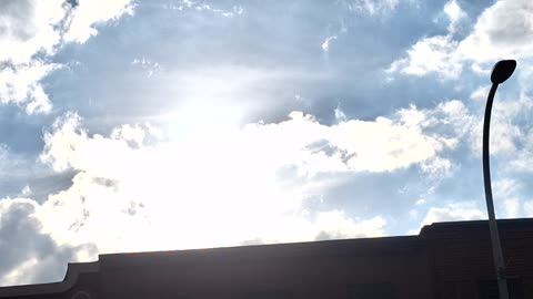 "Clouds" blocking the white sun(blue hue) and the yellow sun