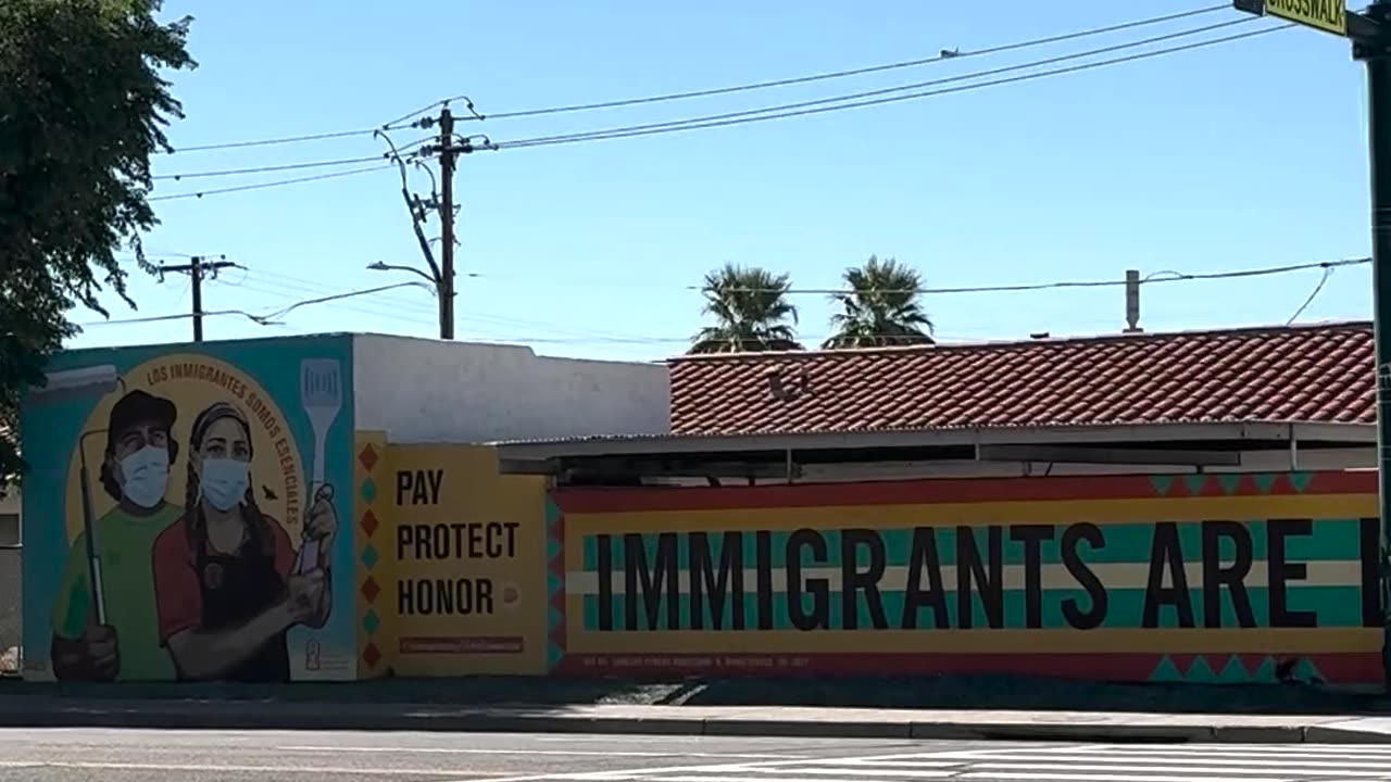 "Immigrants Are Essential" Artwork Spotted in Phoenix, Arizona