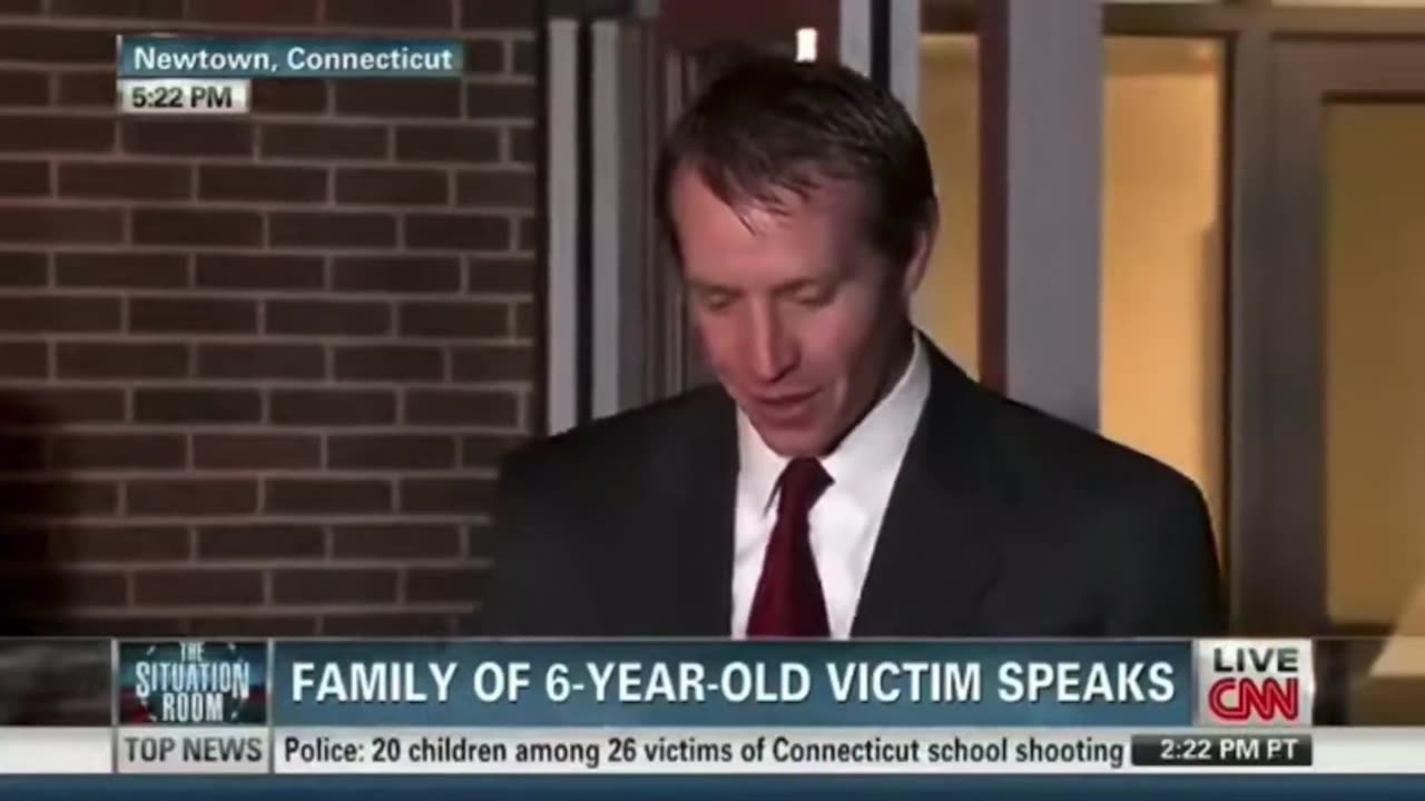 Sandy Hook crisis actor Robbie Parker has a laugh before getting into CHARACTER before speaking