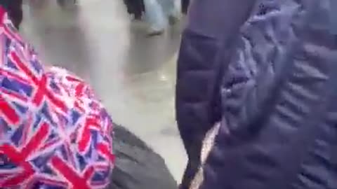 Monstrosity of a woman tries intimidating the pink lady patriots in Newcastle.