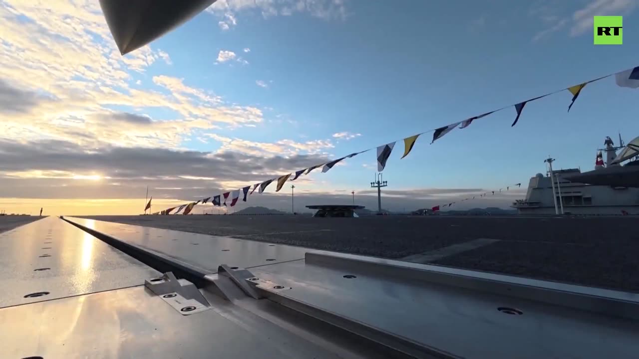 Chinese President Xi Jinping inspects China's new aircraft carrier
