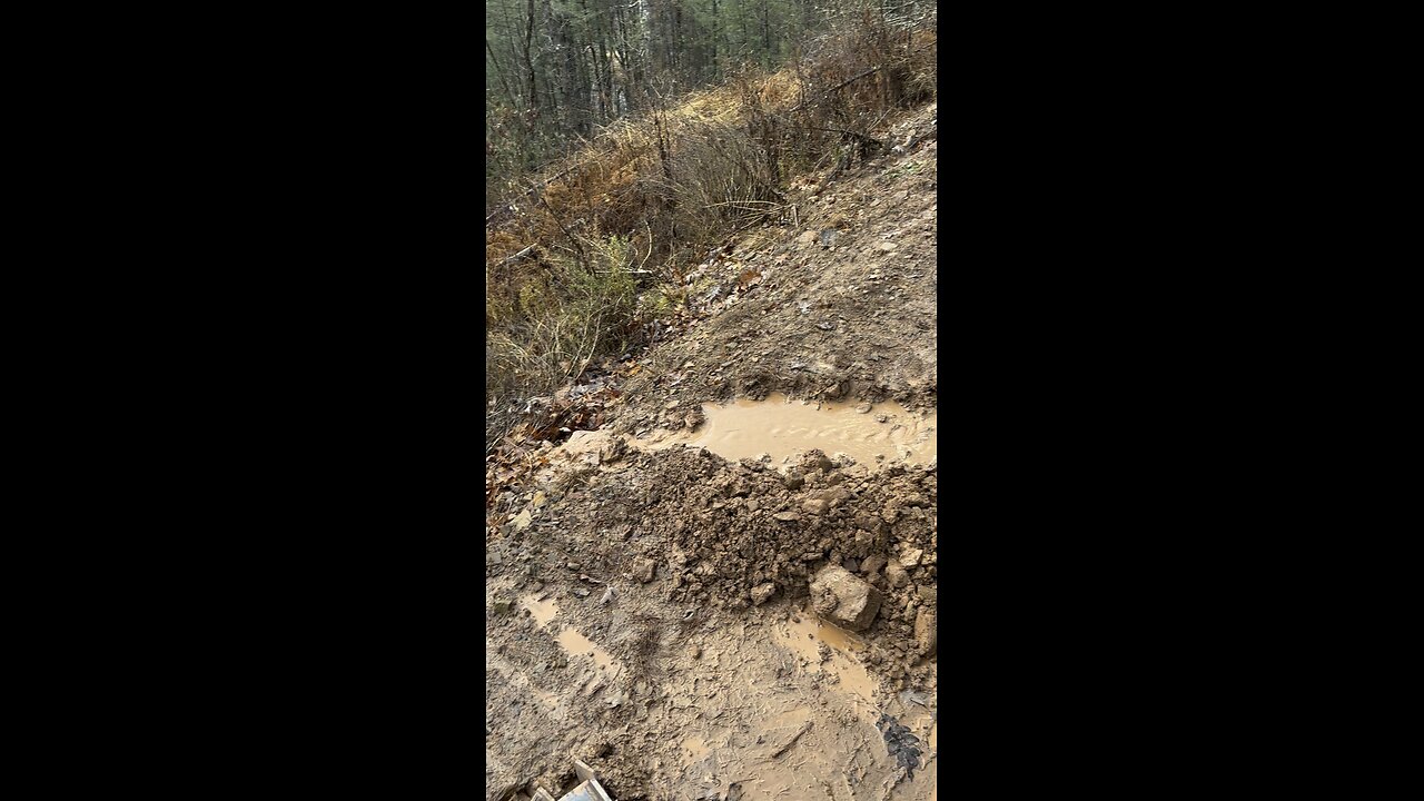 Ditching flooded road in late November