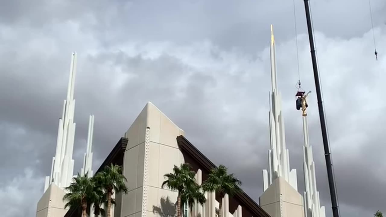 Temple statue back in place